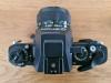 Canon NEW F-1 mit 50 mm 11.4 FD Objektiv,  AE Motor Drive und Blitzgerät 155A