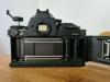 Canon NEW F-1 mit 50 mm 11.4 FD Objektiv,  AE Motor Drive und Blitzgerät 155A