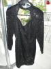 Schwarzes Kleid aus Pailletten