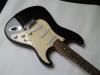 Squier Bullet Strat (Schwarz) inkl. Gigbag,  Saiten
