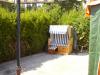 Wohnwagen mit Vorzelt,  Terrasse und eingezäuntem Grundstück