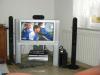 Fernseher mit Unterbau und Surroundsystem /  Heimkino