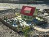 Mehrere selbstgebaute Gartenbahn häuser mit Beleuchtung ab 200 €