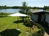 Ferienhaus am Schweriner See in exklusiver Lage an Privatstrand mit Boot,  Steg,  